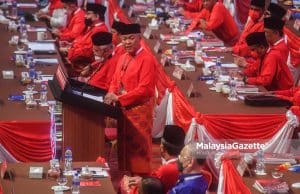The President of UMNO, Datuk Seri Dr Ahmad Zahid Hamidi speaks during the UMNO General Assembly (PAU) 2021 at the World Trade Centre Kuala Lumpur (WTCKL). PIX: MOHD ADZLAN / MalaysiaGazette / 18 MARCH 2022 PM Ismail Sabri PAU 2021