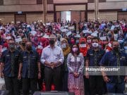 Noh Omar di Penyerahan Bantuan Banjir Sahabat Amanah Ikhtiar Malaysia
