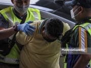 Suspek Bunuh dan Bakar Penyelia Kedai Buku Dihadap ke Mahkamah