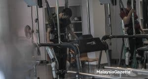 A patient undergoing physiotherapy using the Robot Suit Hybrid Assistive Limb at the Tun Abdul Razak PERKESO Rehabilitation Centre, Melaka. PIX: AMIRUL SHAUFIQ / MalaysiaGazette / 28 MARCH 2022