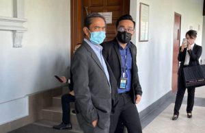 Azizan Abd Rahman, the former Chairman of Labuan Offshore Financial Services Authority (LFSA) (left) is facing charges at the Kuala Lumpur Session Court for abusing his position to gain gratification in the form of protection for Kensington Trust Labuan from being taken action.