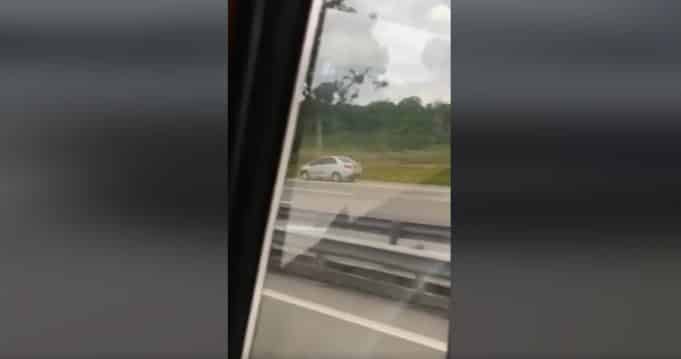 Hit and run Perodua Bezza SKVE driving against traffic accident