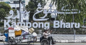 Affendi Muda, a homeless person with disabilities (PWD) in his wheelchair and crutches makes a living by scavenging and selling recycled items around Kuala Lumpur. PIX: AMIRUL SHAUFIQ / MalaysiaGazette / 12 APRIL 2022