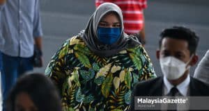 The Founder of Rumah Bonda, Siti Bainun Abd. Razali arrives at the court with her defence counsels for the abuse and negligence of PWD teenager, Bella’s trial. PIX: MUHD NA'IM / MalaysiaGazette / 13 APRIL 2022.