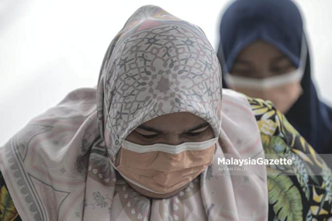 Siti Bainun Ahd Razali Bella Rumah Bonda laundry room abuse neglect Down Syndrome
