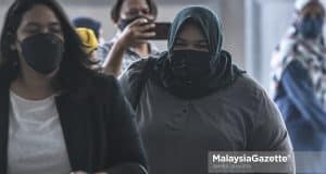 The Founder of Rumah Bonda, Siti Bainun Ahd. Razali arrives at the court for the child neglect and abuse case of the Down Syndrome girl, Bella. PIX: AMIRUL SHAUFIQ / MalaysiaGazette / 20 APRIL 2022.