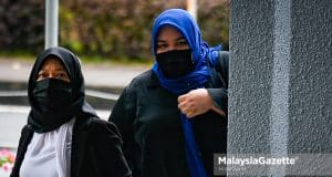 The Founder of Rumah Bonda, Siti Bainun Ahd. Razali arrives at the Kuala Lumpur Court Complex for the child neglect and abuse trial of a 13-year-old Down Syndrome girl, Bella. PIX: MUHD NA'IM / MalaysiaGazette / 21 APRIL 2022.