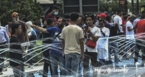 The foreigners roaming around Kuala Lumpur in conjunction with the Hari Raya Aidilfitri public holiday. PIX AMIRUL SHAUFIQ / MalaysiaGazette / 03 MAY 2022.