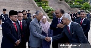 Mahathir resigns Prime Minister Tun Dr. Mahathir Mohamad is accompanied by Deputy Prime Minister Datuk Seri Dr. Wan Azizah binti Wan Ismail while being greeted by Attorney-General (AG), Tommy Thomas during the Monthly Assembly of the Prime Minister’s Department at Dataran Perdana, Bangunan Perdana Putra, Putrajaya. PIX: IQBAL BASRI /MalaysiaGazette / 09 JULY 2018