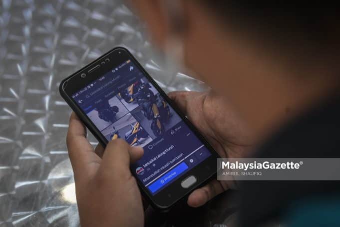 Scam victim during an interview with MalaysiaGazette on the online motorcycle sales scam at Ebid Motor Sdn Bhd Ampang, Selangor. PIX: AMIRUL SHAUFIQ / MalaysiaGazette / 13 JUNE 2022.