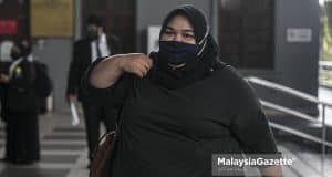 The Founder of Rumah Bonda, Siti Bainun Ahd. Razali arrive at the Kuala Lumpur Court Complex for the abuse and neglect trial of the 13-year-old Down Syndrome girl, Bella. PIX: AFFAN FAUZI / MalaysiaGazette / 13 JUNE 2022. Bella chilli fried rice