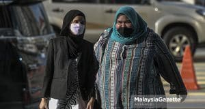 The Founder of Rumah Bonda, Siti Bainun Ahd. Razali arrives at the Kuala Lumpur Court Complex for the abuse and neglect case of Bella, the 13-year-old girl with Down Syndrome. PIX: AFFAN FAUZI / MalaysiaGazette / 16 JUNE 2022.