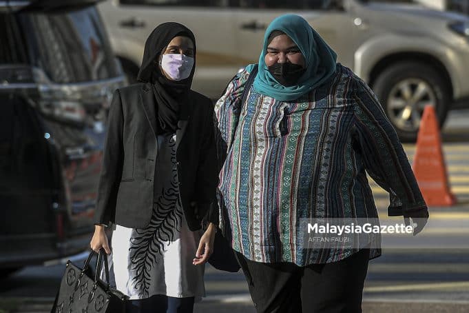 The Founder of Rumah Bonda, Siti Bainun Ahd. Razali arrives at the Kuala Lumpur Court Complex for the abuse and neglect case of Bella, the 13-year-old girl with Down Syndrome. PIX: AFFAN FAUZI / MalaysiaGazette / 16 JUNE 2022.