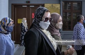 Zizie mohon gugur tiga pertuduhan rasuah RM2.8juta