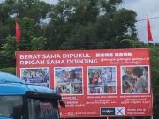Papan iklan “berat sama dipukul” diturunkan
