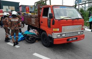 Wanita maut terperosok bawah lori