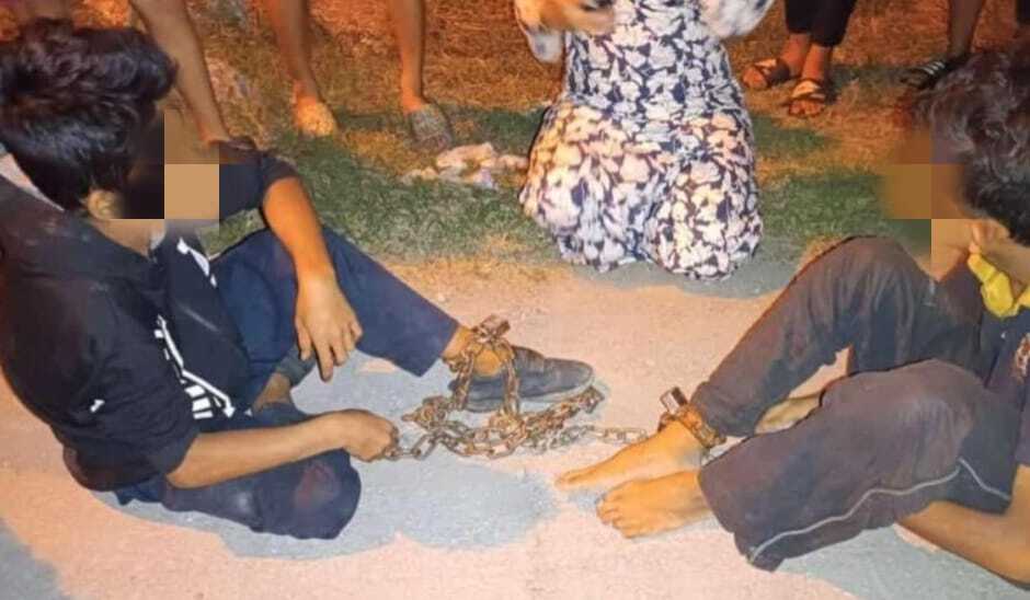 Tiga beradik dipercayai didera, dua dirantai di kaki