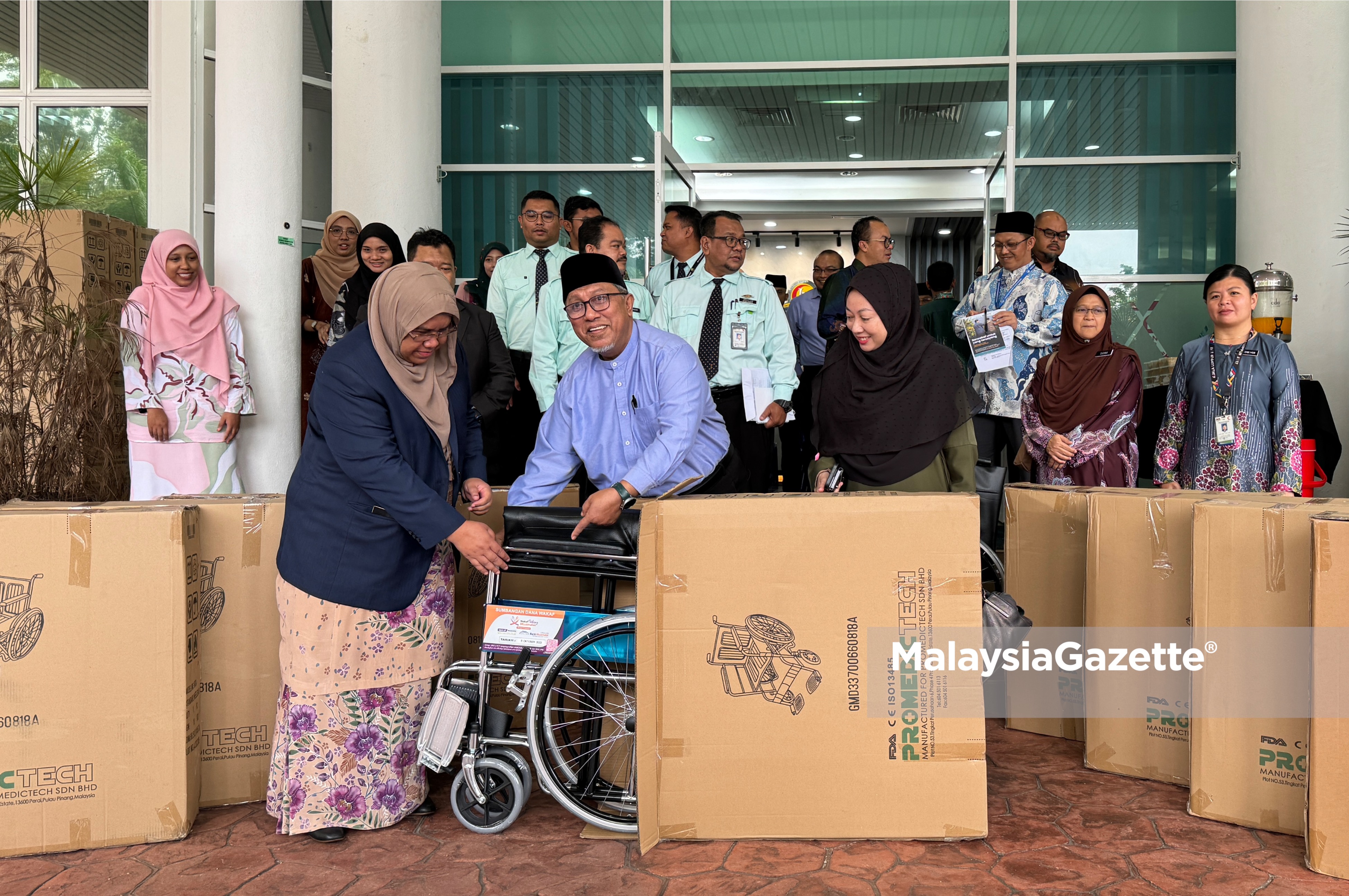 Wakaf Pahang sumbang 158 kerusi roda kepada JKNP