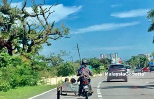 Polis tahan warga asing naik motosikal roda tiga bawa kanak-kanak