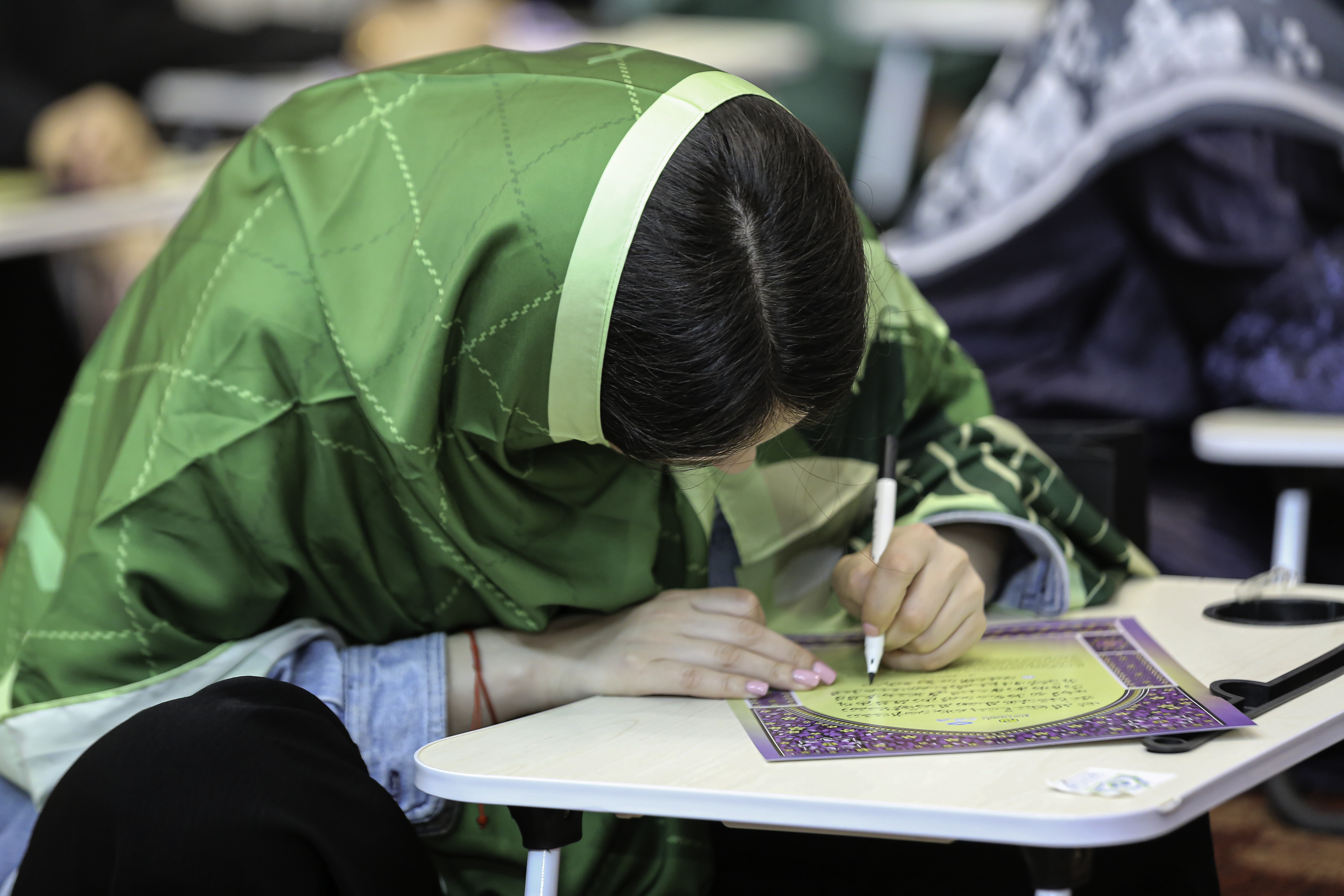 Yayasan Restu memartabat, membudaya menyalin, menulis ayat Al-Quran