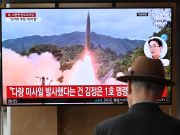 N. Korea jams GPS signals, affecting ships, aircraft in South A man watches a television screen showing a news broadcast with file footage of a North Korean missile test, at a train station in Seoul on May 30, 2024. North Korea fired a salvo of short-range ballistic missiles early May 30, Seoul's military said, hours after Pyongyang sent hundreds of trash-filled balloons across the border to punish South Korea. (Photo by Jung Yeon-je / AFP)