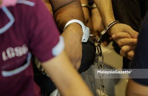 ‘Shopping’ sakan guna kad debit orang lain, tiga beradik ditahan polis Gari