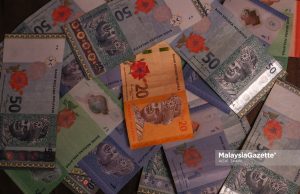 Ringgit dibuka rendah berbanding dolar AS