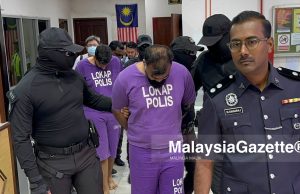 Dua rakan tak mengaku salah lakukan rompakan bersenjata
