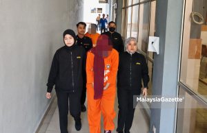 Penolong jurutera kementerian, suami disyaki rasuah RM15,000