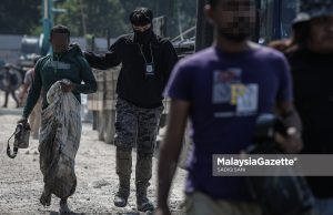 Ops Gempur Sasar: PATI terjun lumpur cuba lari daripada anggota JIM