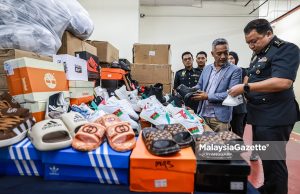 Lapan stor simpan barang jenama tiruan diserbu, rampasan cecah RM400,000