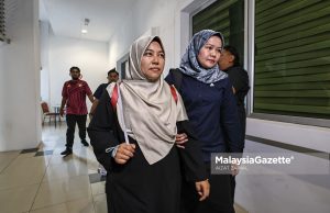 Suri rumah mengaku tidak bersalah muat naik hantaran jelik terhadap Agong