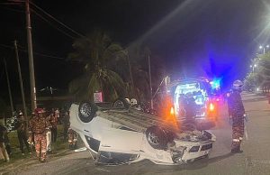 Wanita warga Indonesia maut, dua cedera kereta terbalik