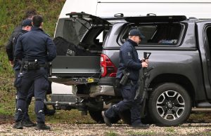 Australian police urge gunman to surrender after officers killed