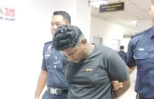 Pengawal keselamatan Singapura didakwa cederakan pengawal keselamatan