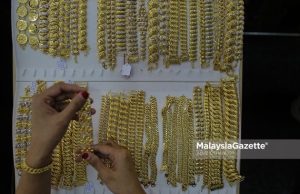 Harga emas melepasi paras rekod AS$5,000 di tengah ketidaktentuan dasar Trump