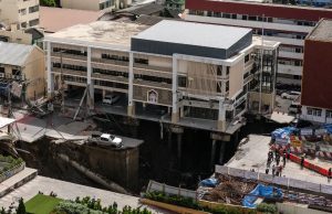 Massive sinkhole in Bangkok street forces evacuations