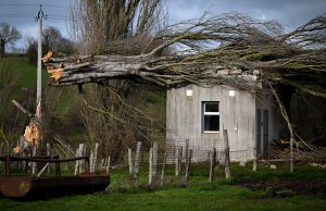 New UK death after storms, 100,000 French homes without power