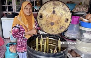 Bakar lemang dalam tong dram kini lebih cepat