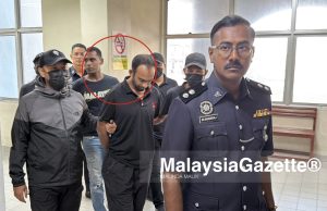 Dua rakan didakwa lakukan rompakan berkumpulan di kedai serbaneka