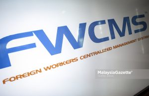 FWCMS bantu kekang kartel buruh asing – penganalisis Logo Sistem Pengurusan Berpusat Pekerja Asing (FWCMS) di Cyberjaya. Foto HAZROL ZAINAL, 20 APRIL 2022.