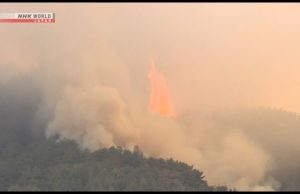 Wildfires spread towards northern Japan town