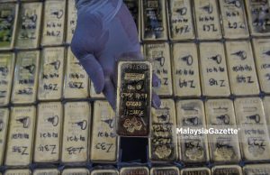 US arrests ex-CIA official with $40 mn in gold at home