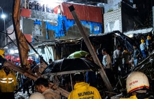 Building collapse kills six in Mumbai as torrential rain batters city