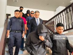 Dua polis Bukit Aman didakwa minta rasuah RM2,000 habuan tak saring air kencing suspek
